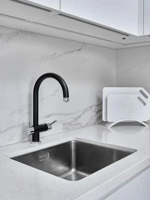 Modern Kitchen Countertop with Marble Backsplash